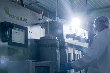 Technician operating advanced Nanotechnology equipment