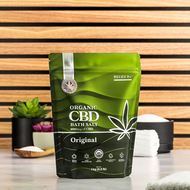 Organic CBD bath salts on a bathroom counter - 1kg bag