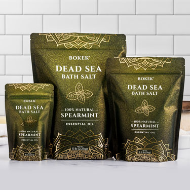 Organic Spearmint dead sea bath salts on a bathroom counter