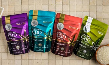 Bokek organic scented dead sea salts in pouches on a marble surface